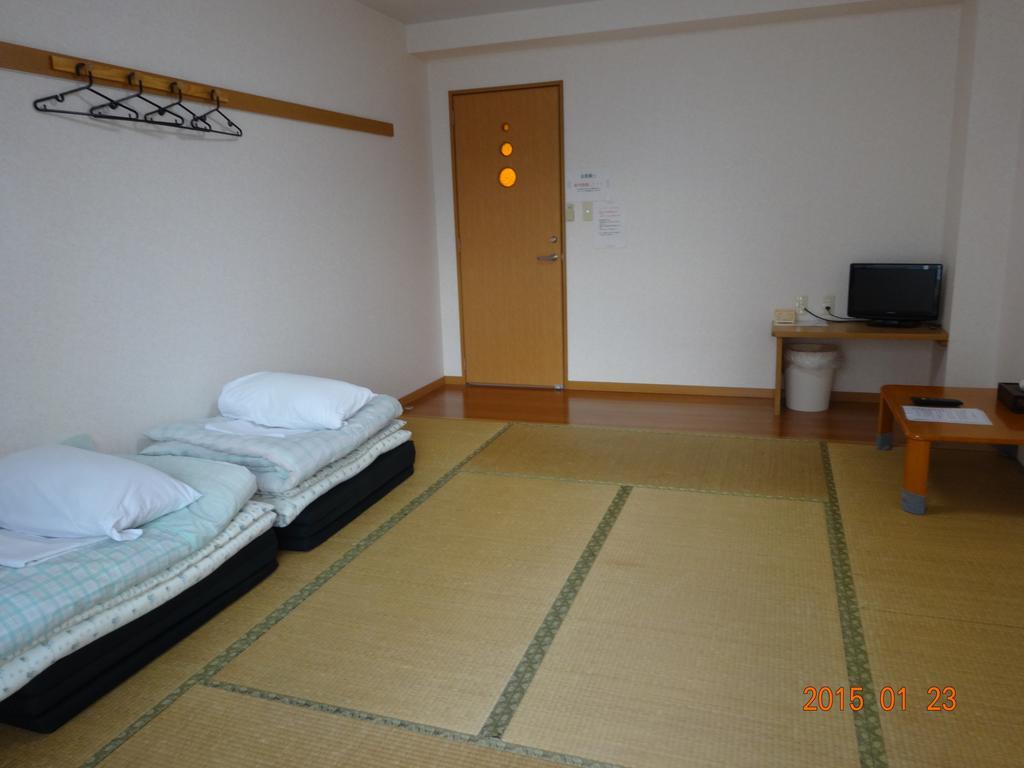 Hôtel Minshuku Getto à Naha Chambre photo